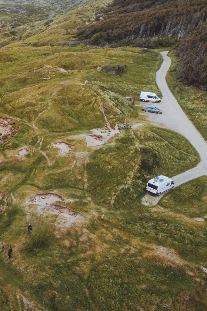 drone shot from above of our camper parked in Denmark
