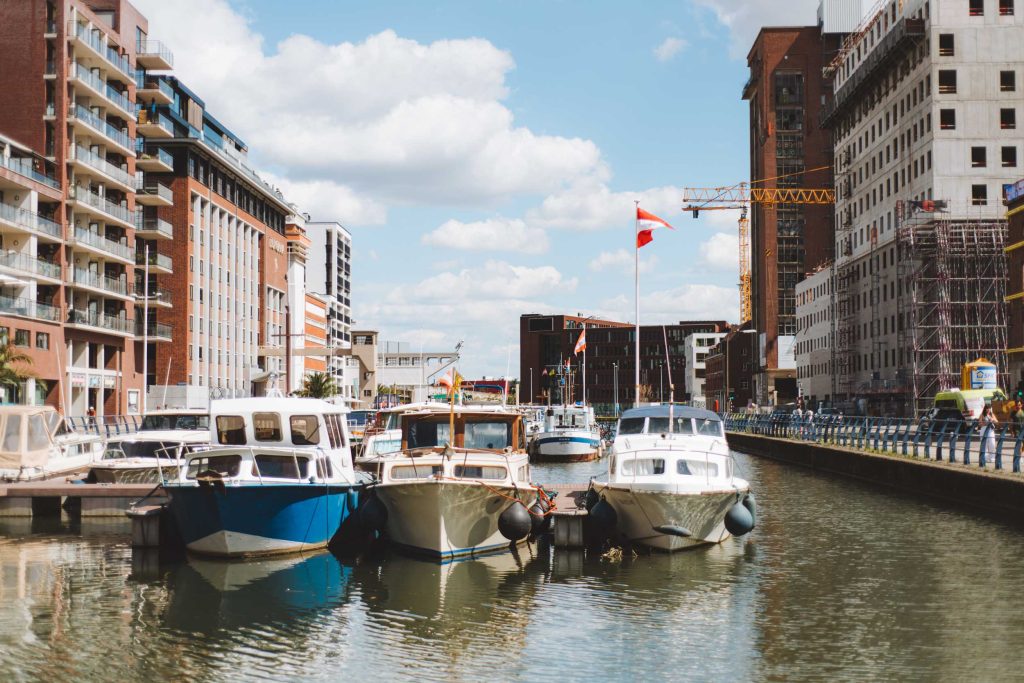 boats in the harbor at the vaartkom in leuven