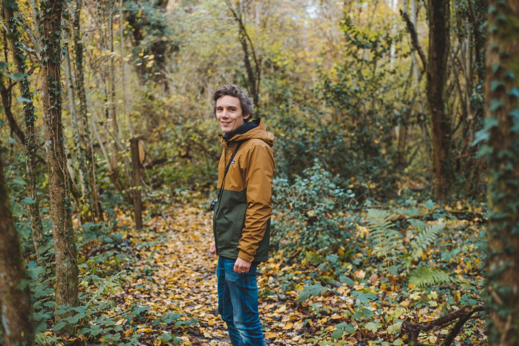 florian posing while walking in the forest