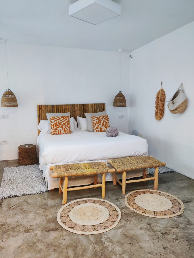 white bedroom in minimalistic apartment on lanzarote