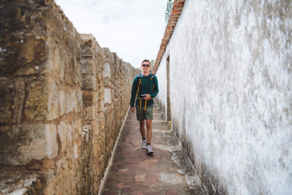 florian walking on the historic wall that loops around obidos centre