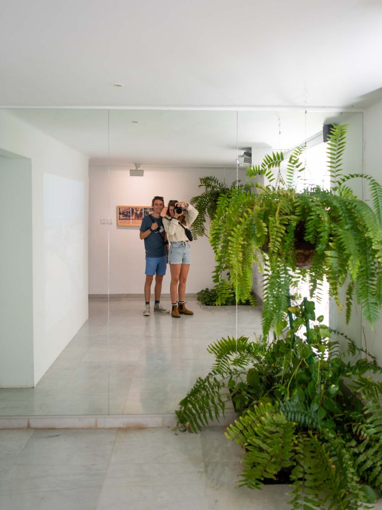 kelly and florian self portrait in mirror with plants