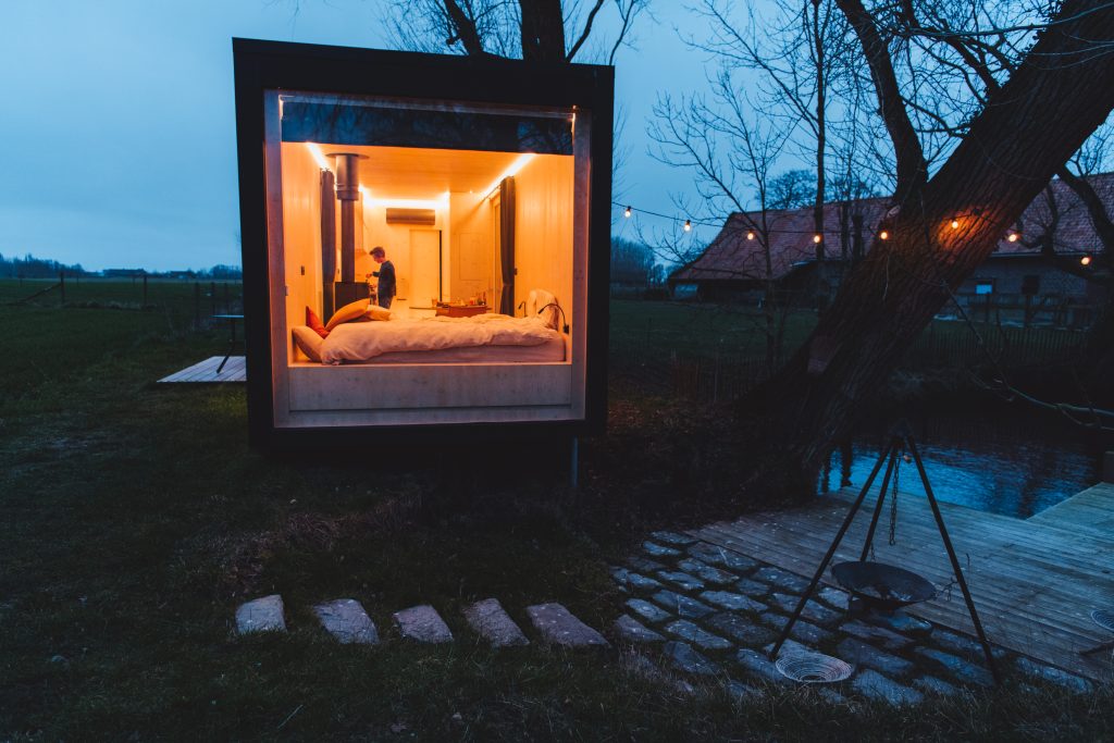 cabin in the evening from outside looking in