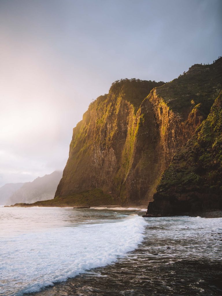 sun hitting the cliffs at praia do faial in madeira