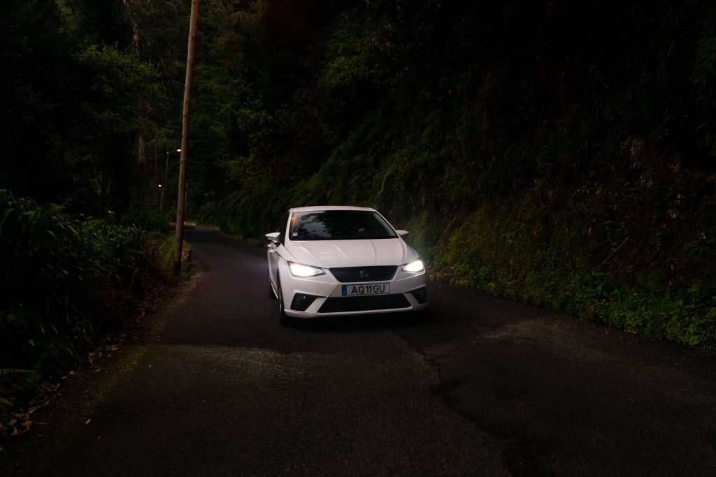 white rental car on the road in madeira