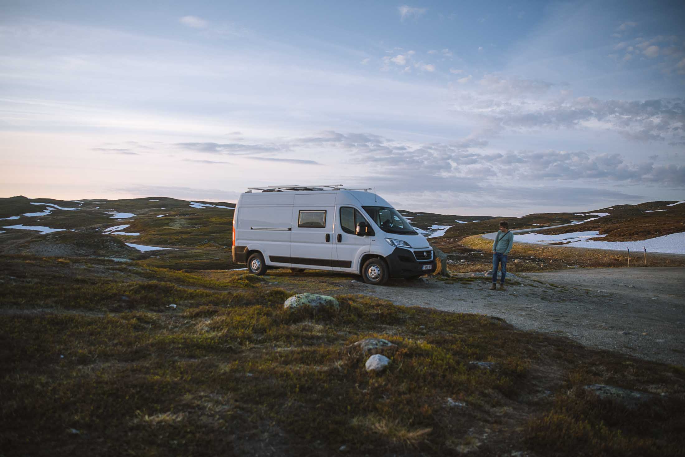 our fiat ducato camper standing on the stekenjokk plateau in sweden with florian standing next to it
