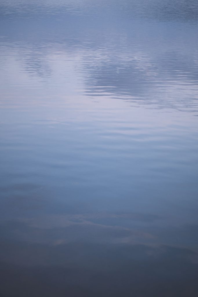 ripples in the lake during sunset